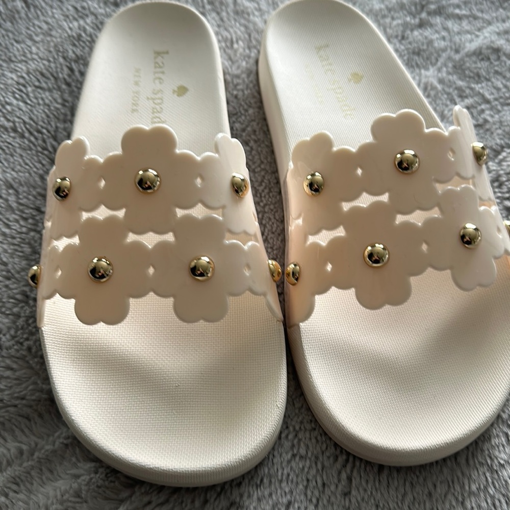 Never worn Kate spade ivory with gold beads pool slides. Size 8